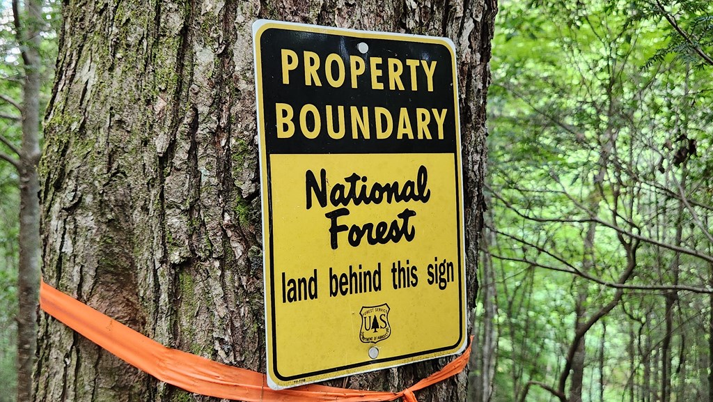 38-ac Tumbling Creek Road Copperhill, TN 37317 - Photo 28 of 65 a sign on the side of a building