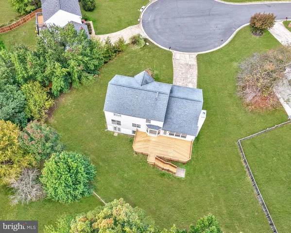 a kitchen with a stove a sink and a refrigerator