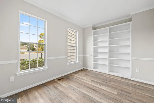 an empty room with windows