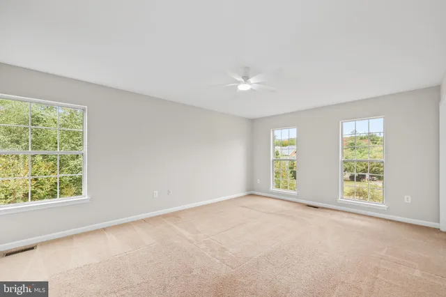 a bathroom with a bathtub and a sink