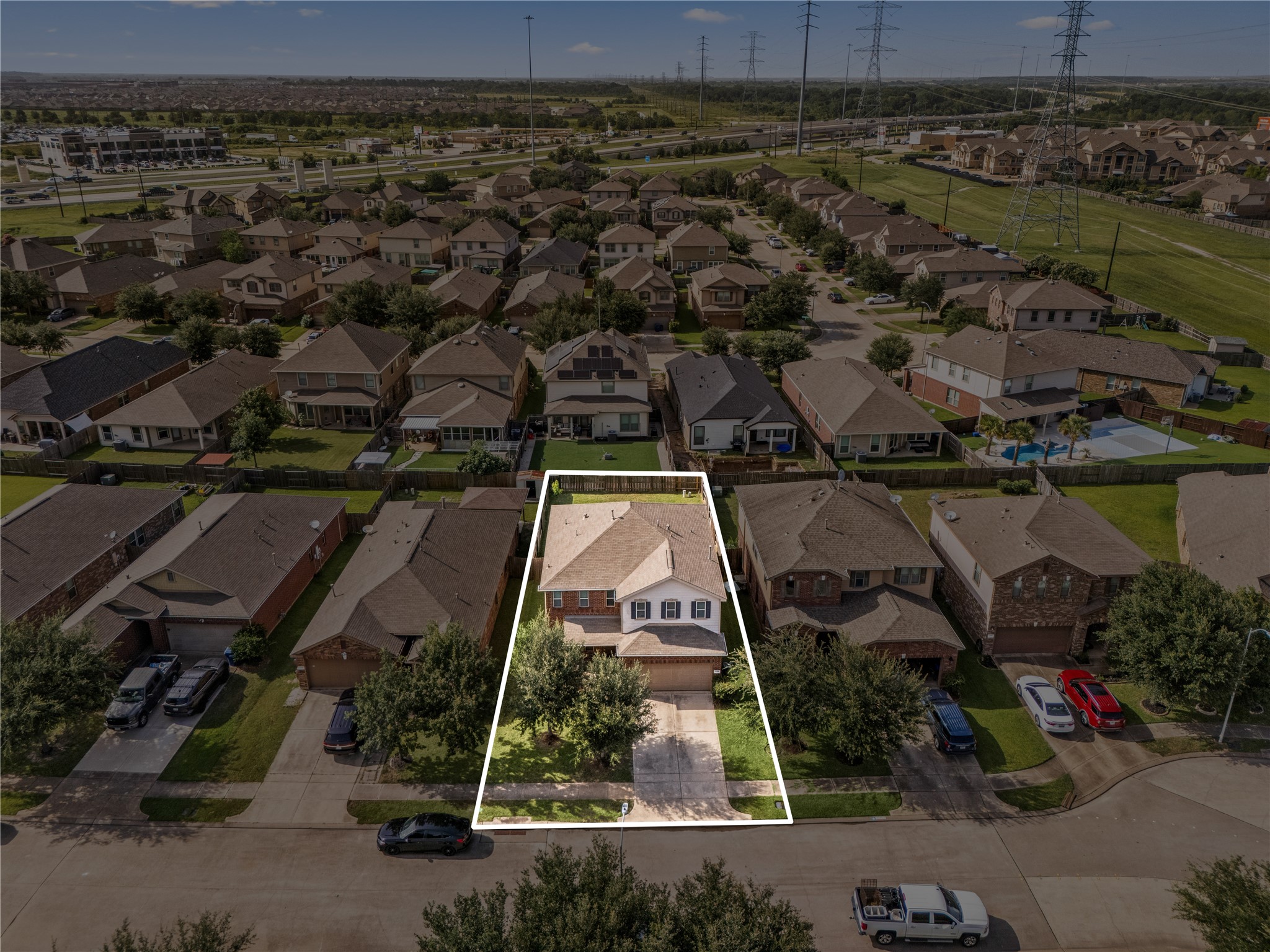 22414 Bellwick Ridge Lane Katy, TX 77449 - Photo 21 of 23 Bird's-eye view showcasing the home's location within the neighborhood and its convenient access to Grand Parkway (TX-99), I-10, shopping, dining, and nearby amenities.