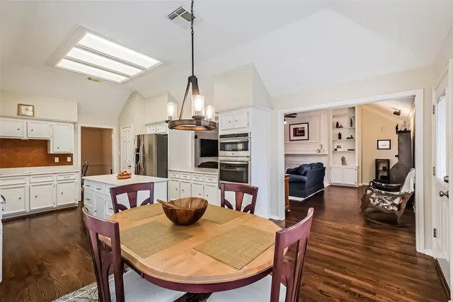 a view of a dining room with furniture