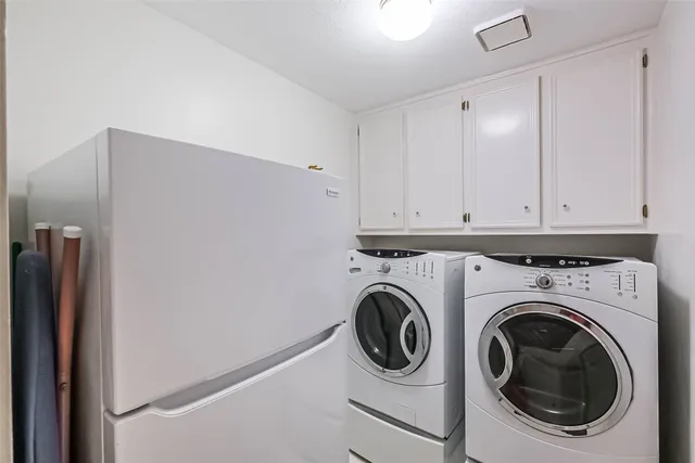 a bed room with a bed and a window