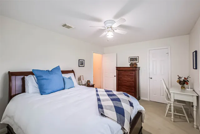 a bathroom with a sink mirror toilet and bathtub