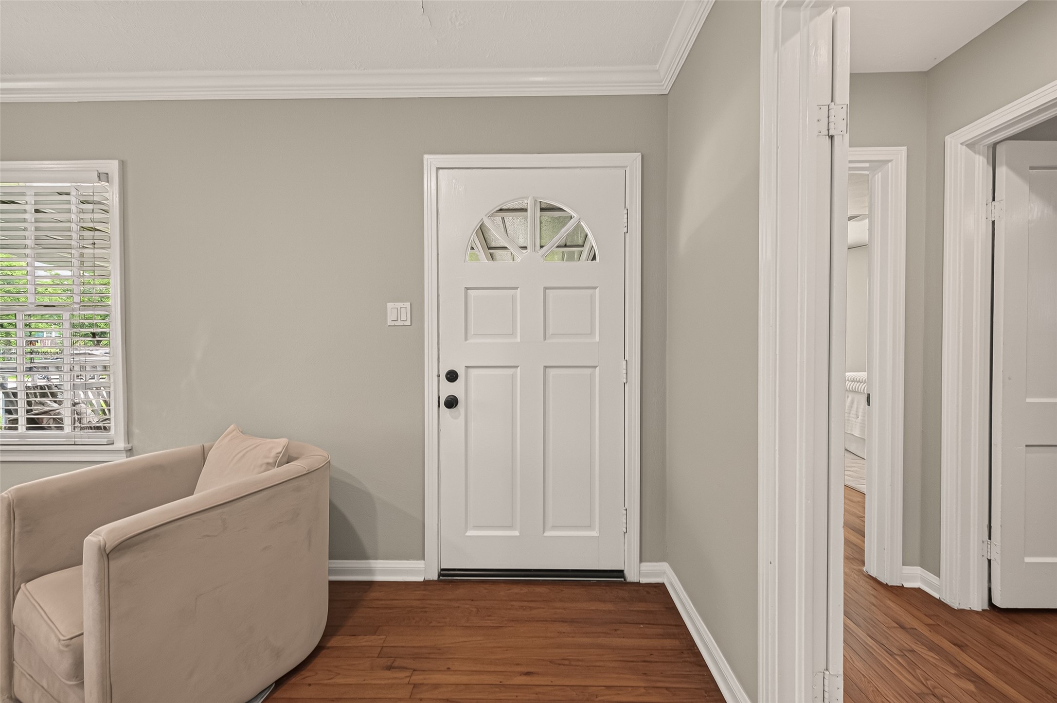2019 Gostick Street Houston, TX 77008 - Photo 10 of 36 a view of room with window and wooden floor
