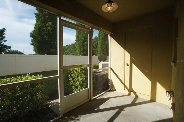 a kitchen with granite countertop a sink and a stove