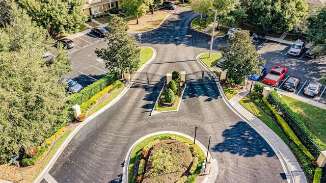 an aerial view of a house with a swimming pool