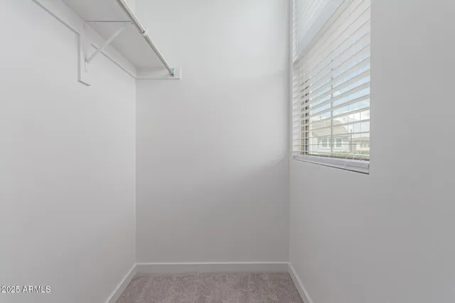 a view of a room that has a window in it