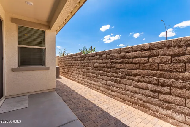 a view of an empty room with a balcony