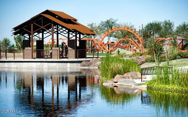a view of swimming pool with outdoor seating