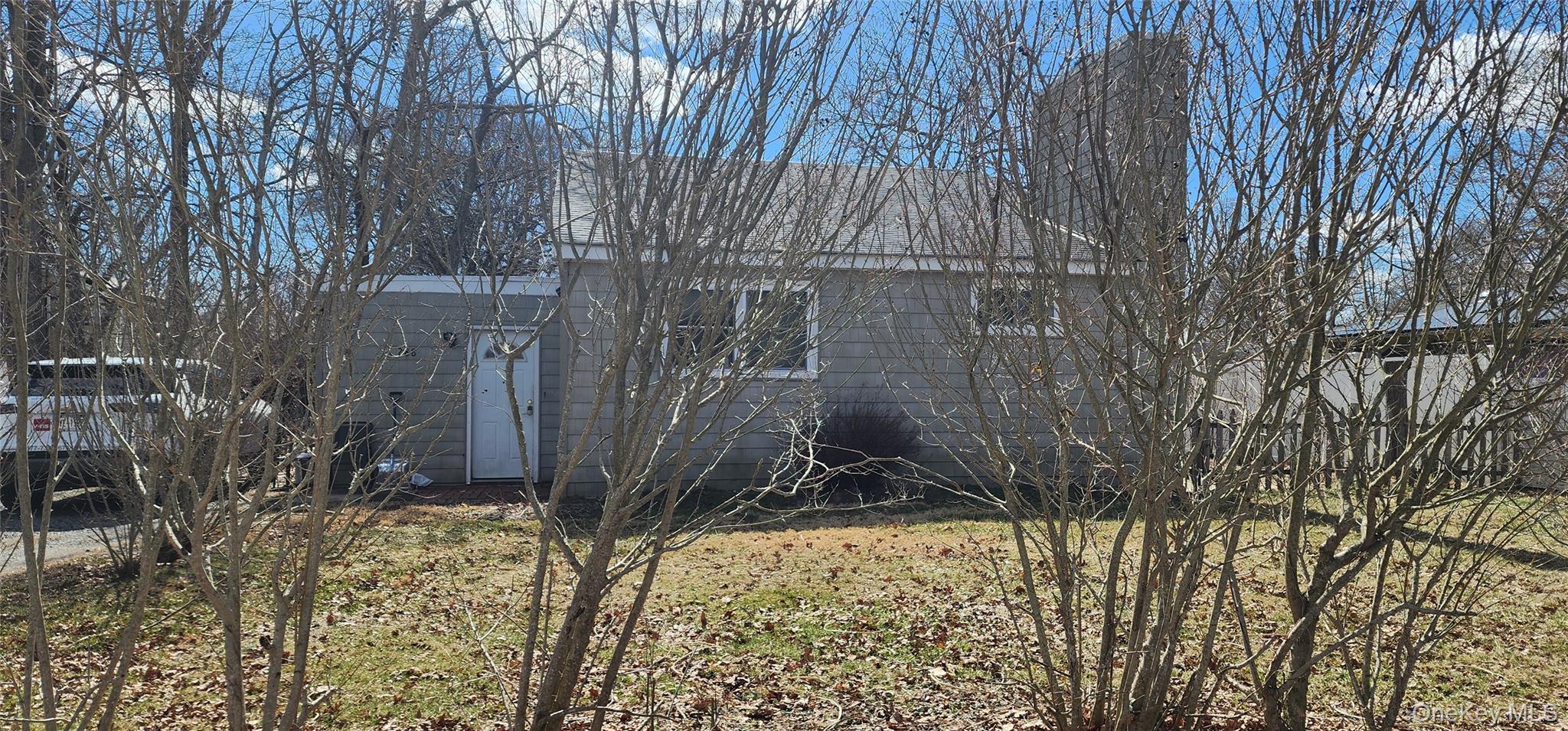 288 Cedar Road West Mastic Beach, NY 11951 - Photo 2 of 2 a view of a backyard