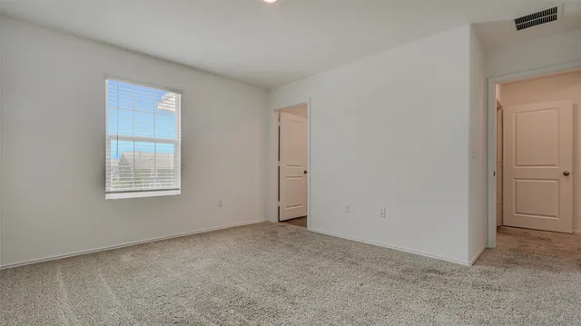 a view of a small space with window in it