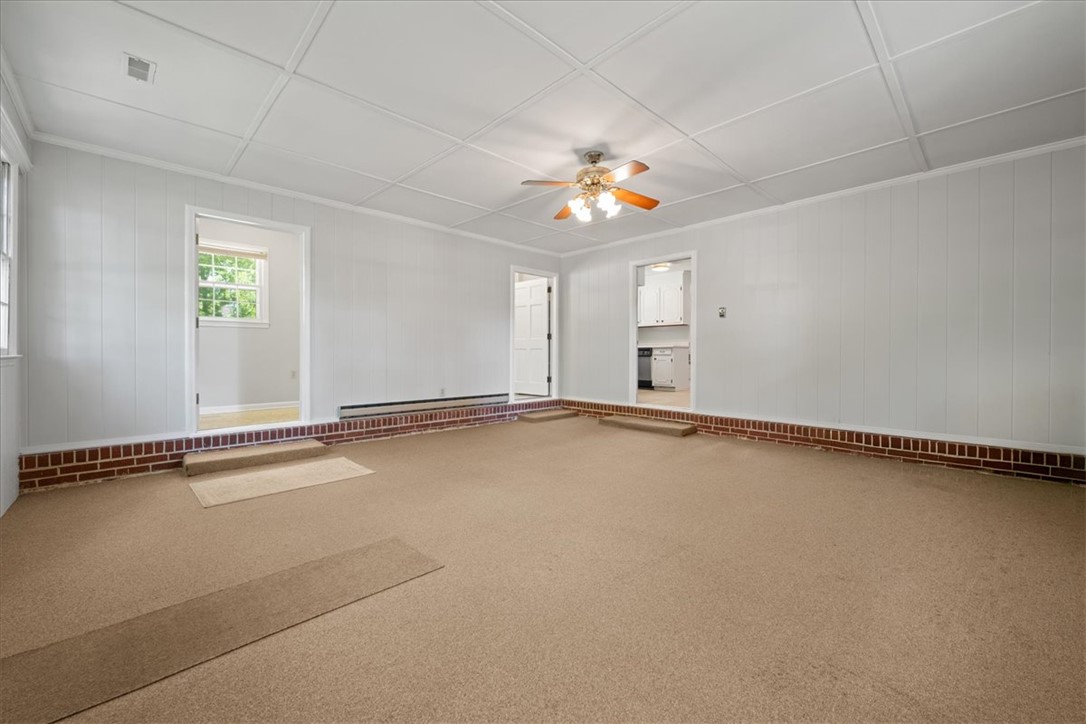 304 Shaw Road Honea Path, SC 29654 - Photo 14 of 39 This versatile room offers a comfortable and inviting atmosphere for everyday living.