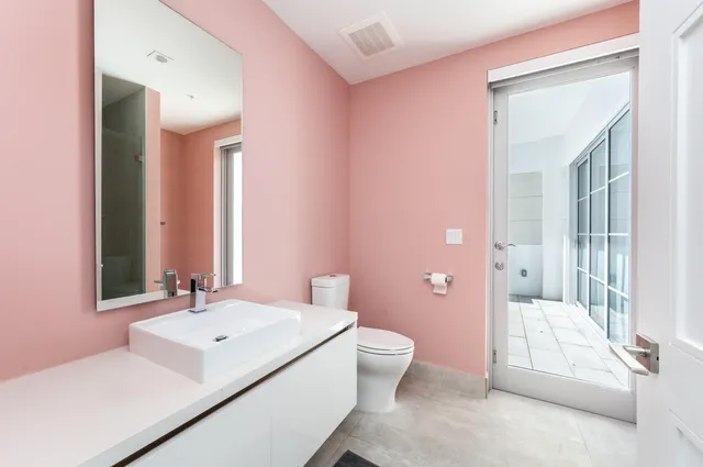 a living room with fireplace furniture and a flat screen tv