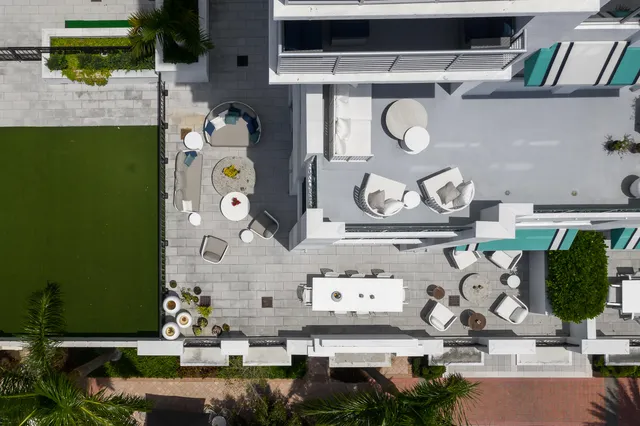 a view of a patio with swimming pool