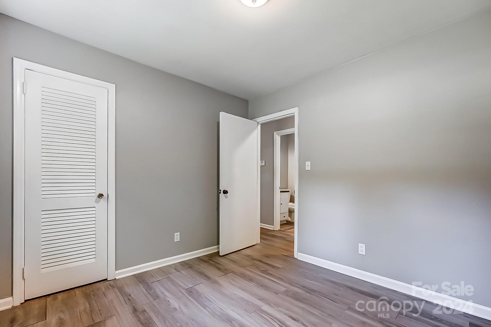 3218 Valley Grove Road Charlotte, NC 28227 - Photo 19 of 23 a view of an empty room with closet and a window