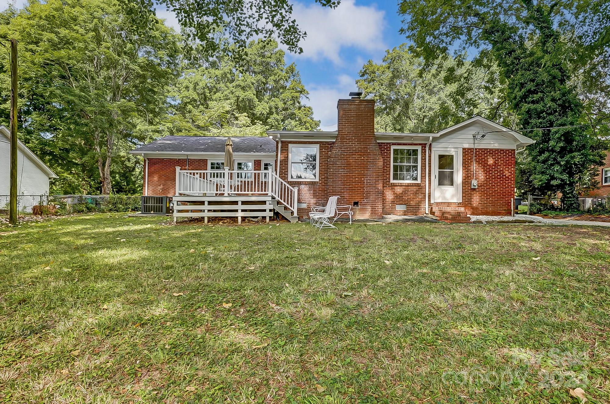 3218 Valley Grove Road Charlotte, NC 28227 - Photo 22 of 23 a front view of a house with a yard