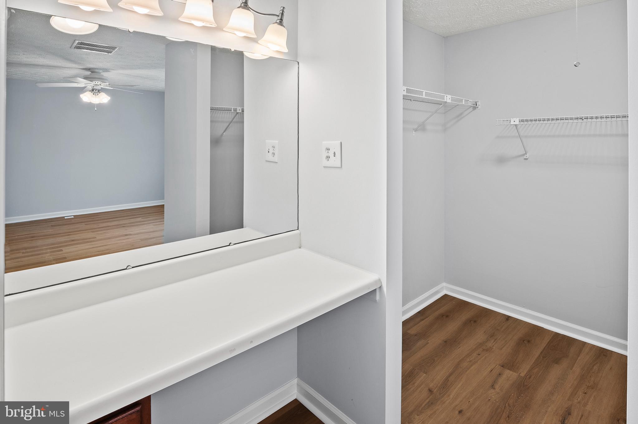 7346 Hidden Cove Columbia, MD 21046 - Photo 15 of 26 a view of bathroom with a sink and mirror