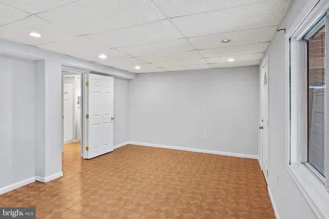 a bathroom with a sink vanity and a mirror