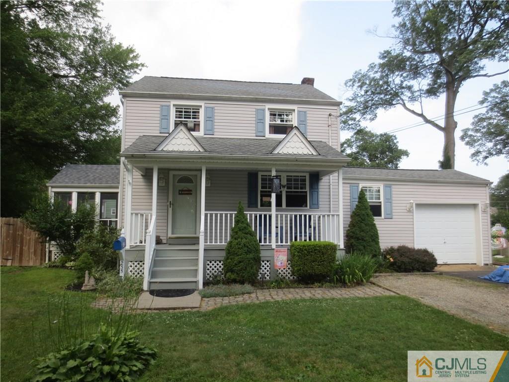 235 Maple Avenue Dunellen, NJ 08812 - Photo 2 of 20 front view of a house and a yard