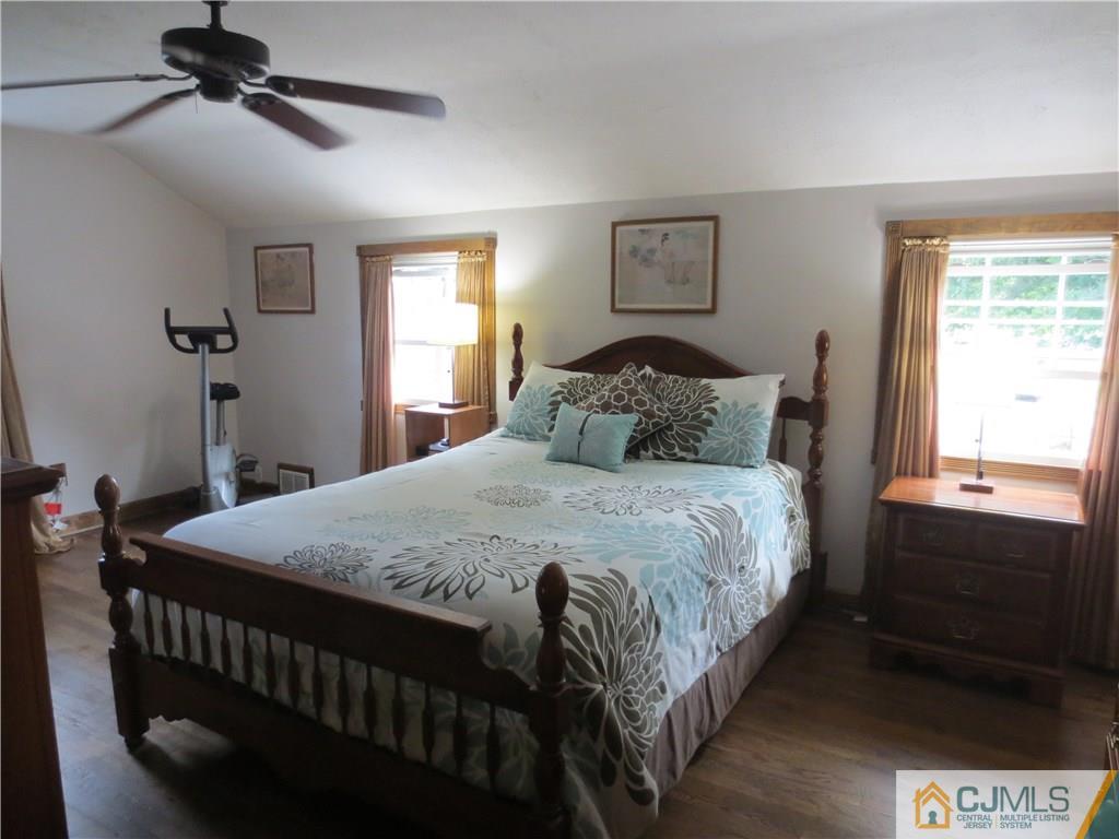 235 Maple Avenue Dunellen, NJ 08812 - Photo 16 of 20 a bedroom with a bed and a window