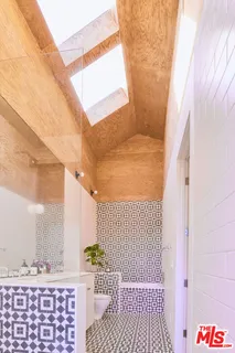 a bathroom with a sink and a bathtub