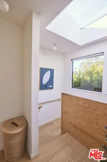 a room with toys and dresser