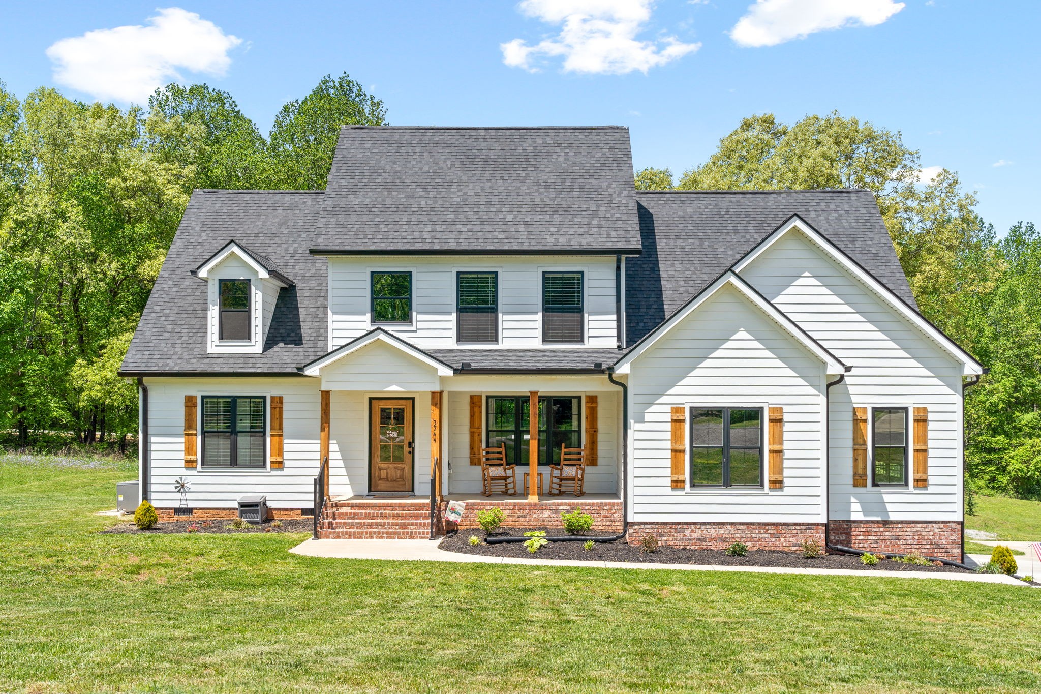 3744 McGregor Road Adams, TN 37010 - Photo 1 of 48 a front view of a house with a yard