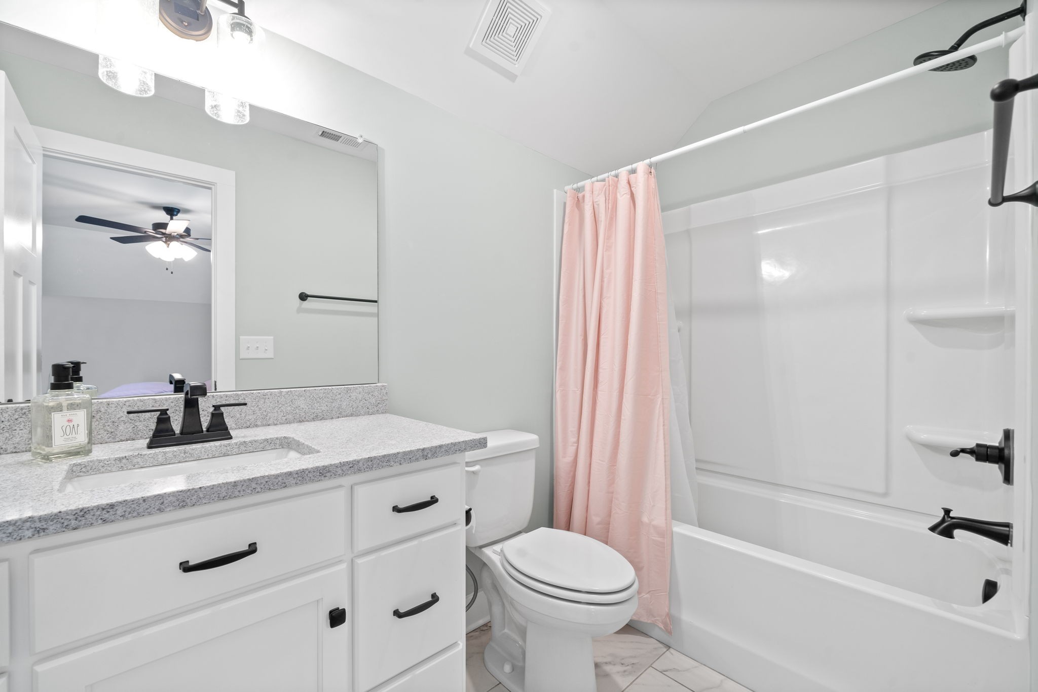 3744 McGregor Road Adams, TN 37010 - Photo 27 of 48 a bathroom with a sink a toilet and shower