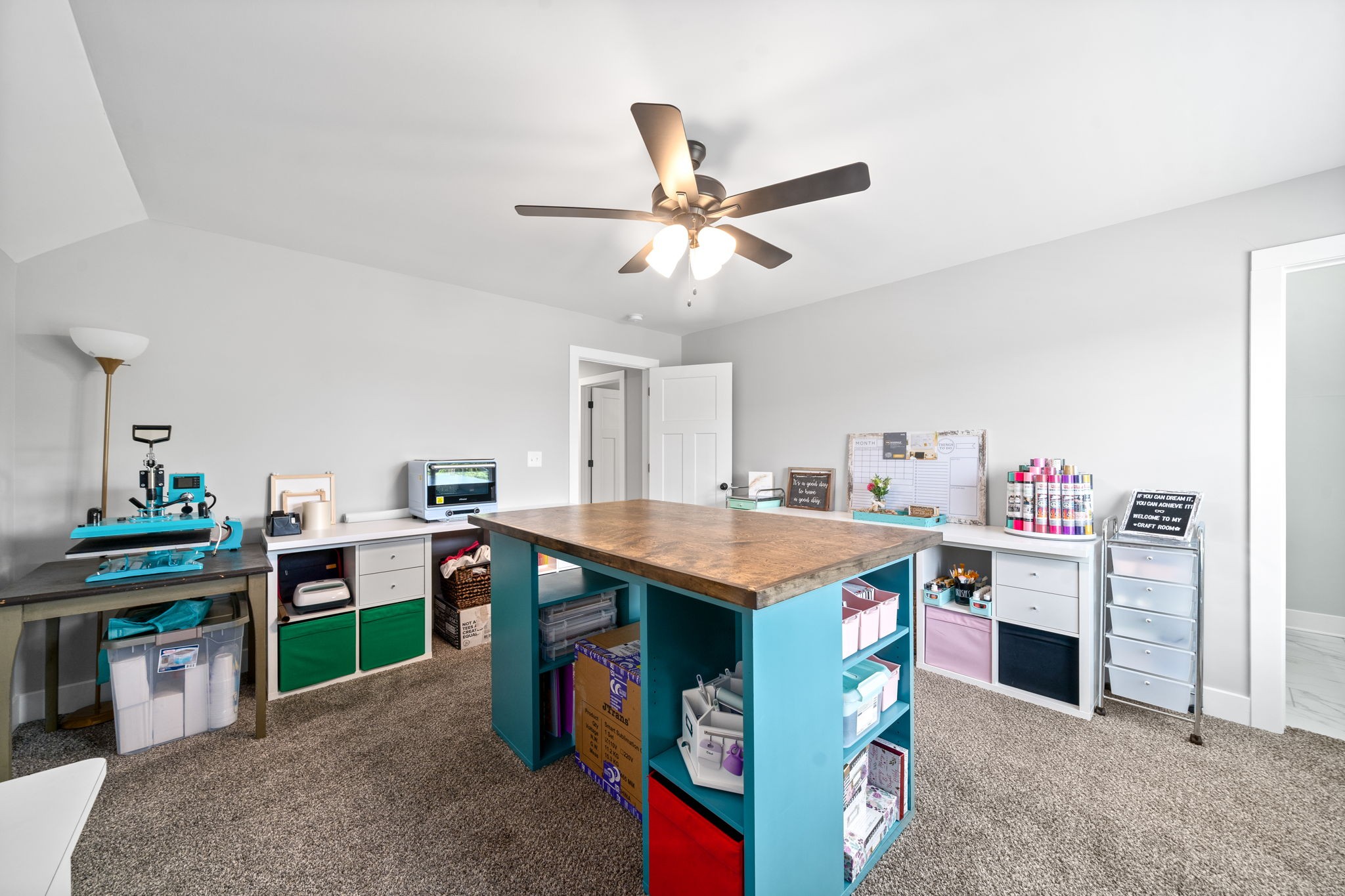 3744 McGregor Road Adams, TN 37010 - Photo 34 of 48 a utility room with cabinets and wooden floor