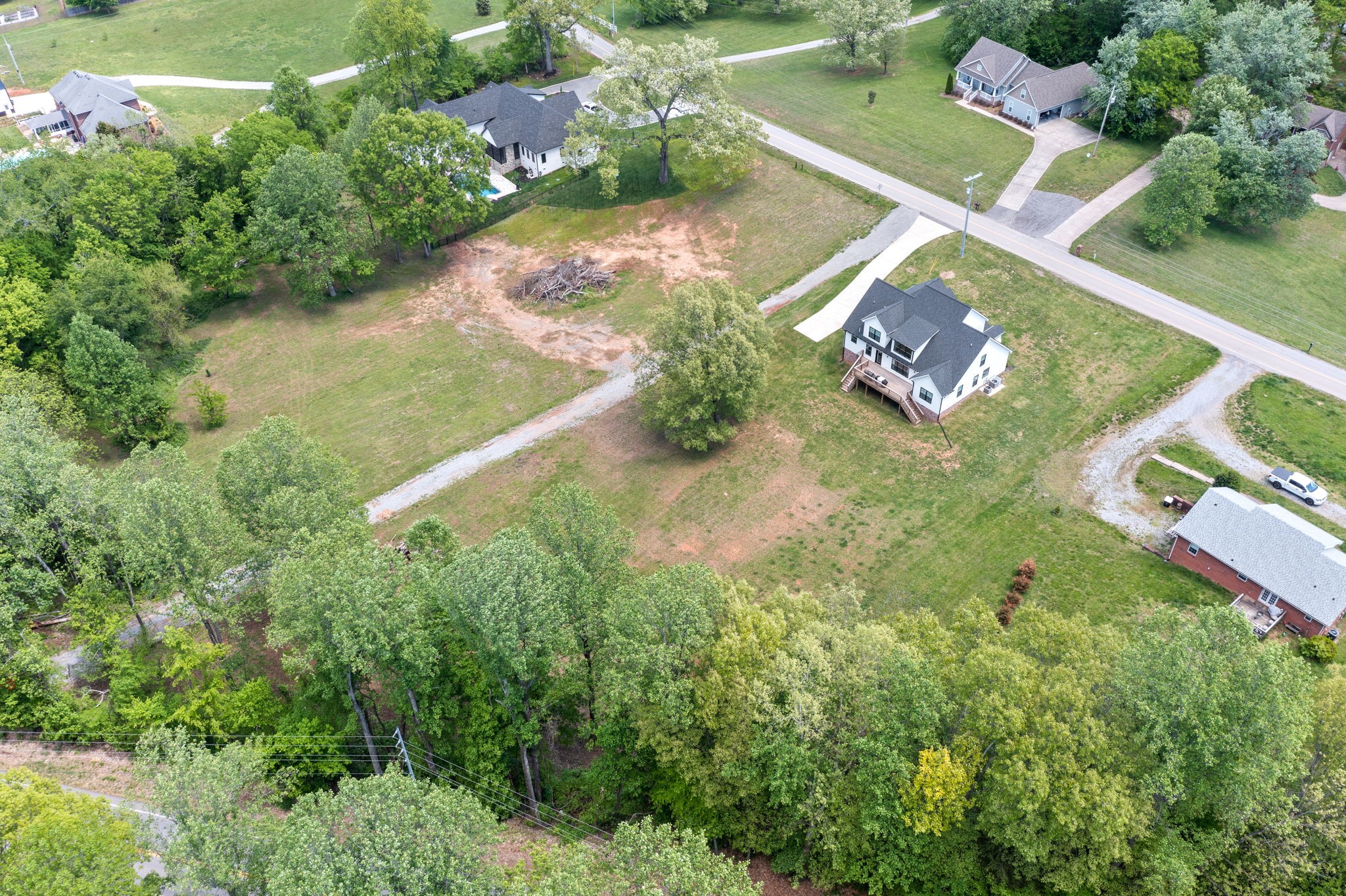 3744 McGregor Road Adams, TN 37010 - Photo 44 of 48 an aerial view of house with yard swimming pool and outdoor seating