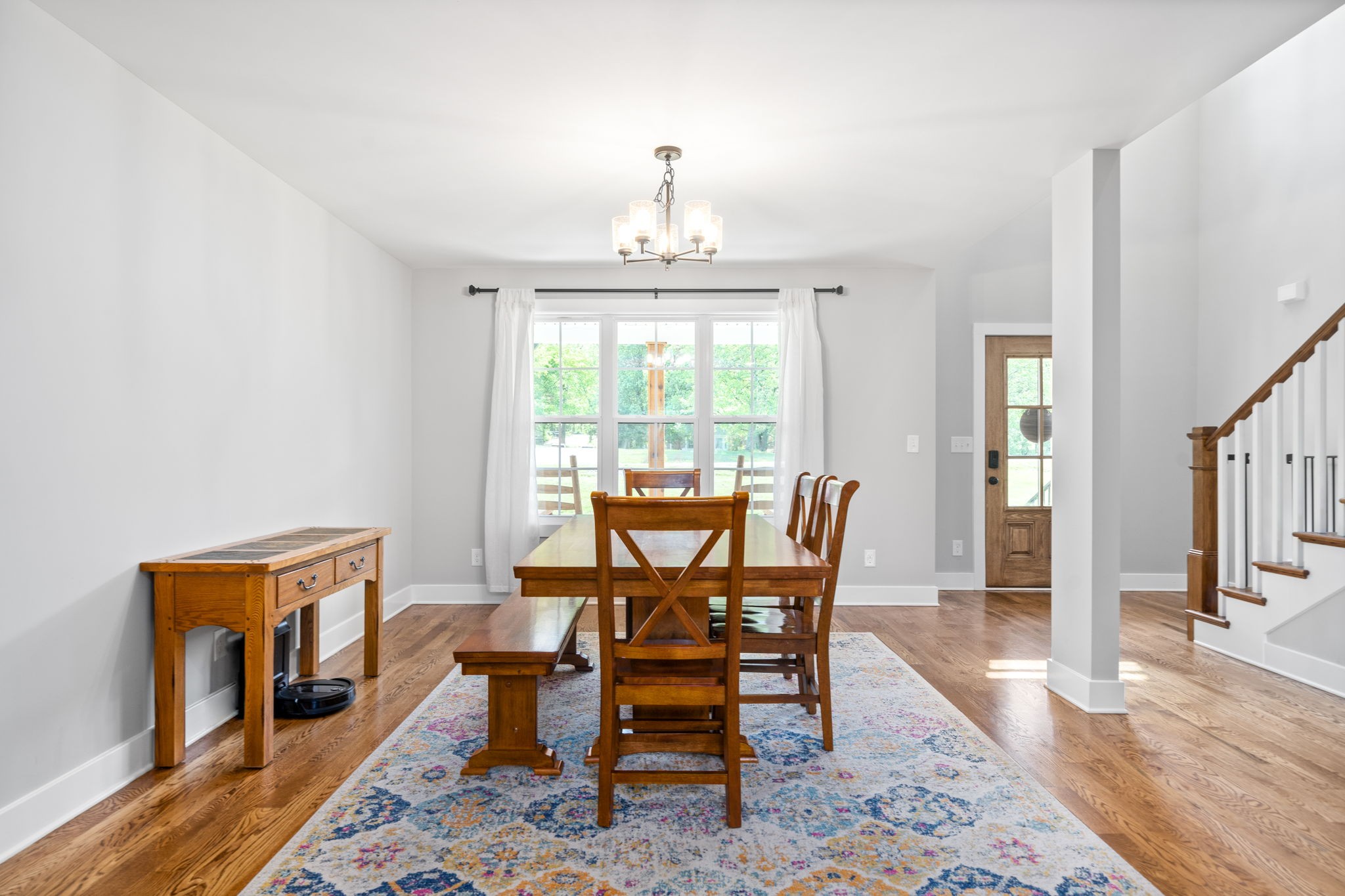 3744 McGregor Road Adams, TN 37010 - Photo 5 of 48 a view of a dining room with furniture window and wooden floor