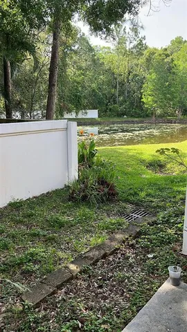 a view of a porch with a yard