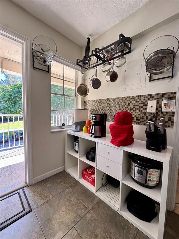 2601 South Course Drive, Unit 305 Pompano Beach, FL 33069 - Photo 4 of 20 a utility room with dryer and washer