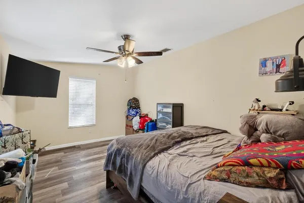 a view of an empty room and bathroom