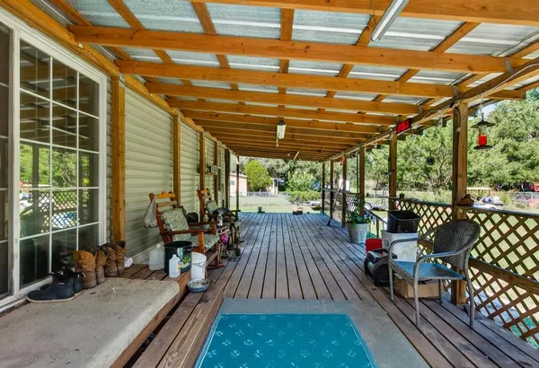 a view of outdoor space with wooden deck