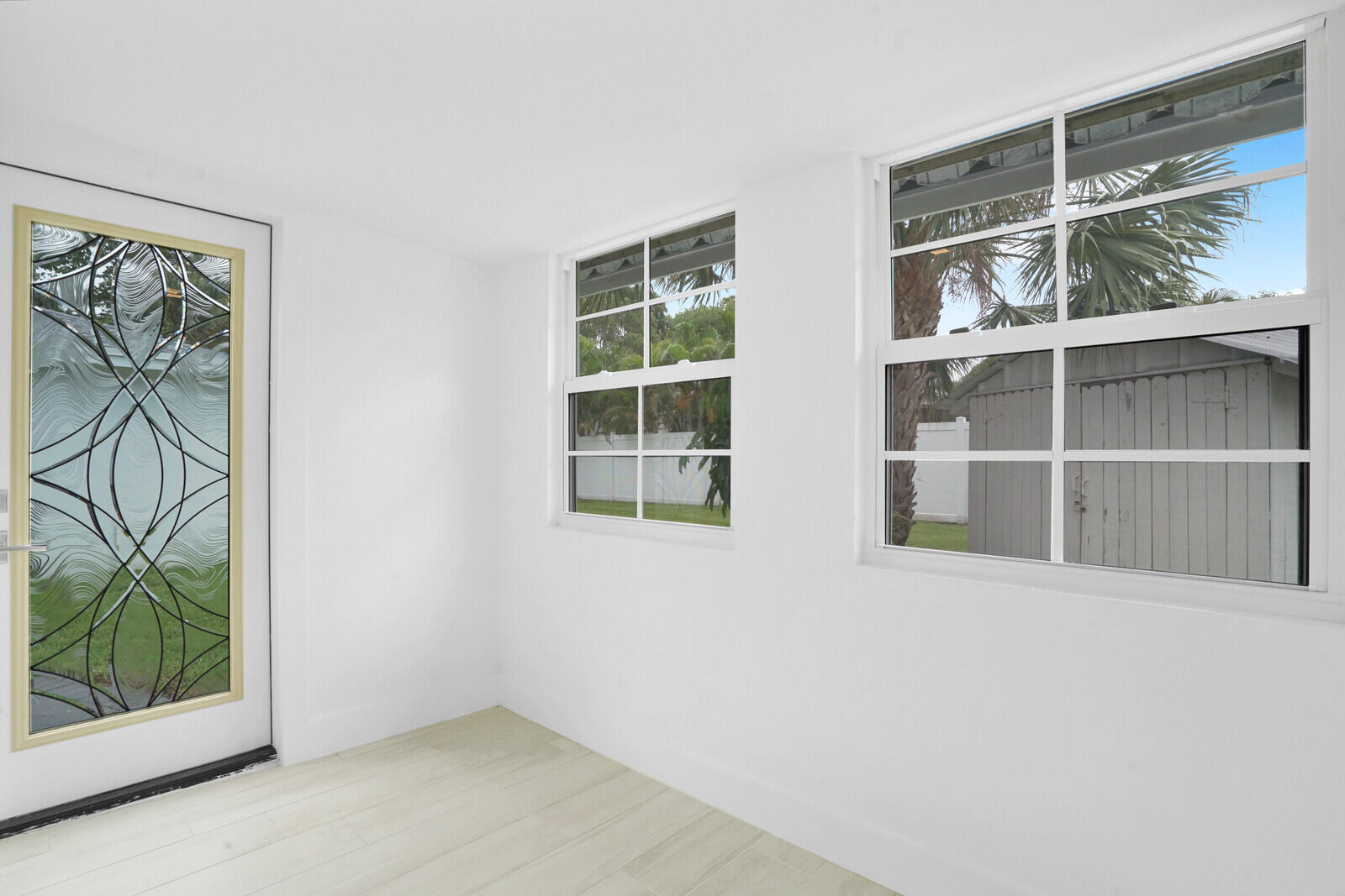 826 Sunset Road West Palm Beach, FL 33401 - Photo 35 of 52 an empty room with windows