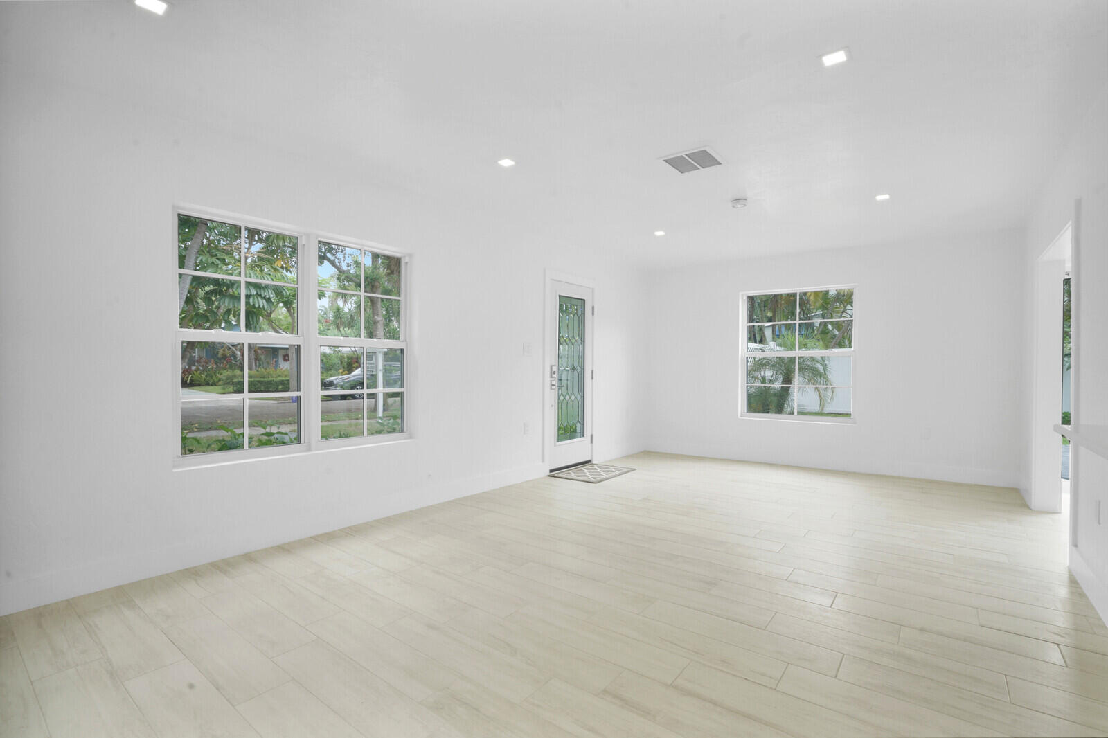 826 Sunset Road West Palm Beach, FL 33401 - Photo 6 of 52 an empty room with windows