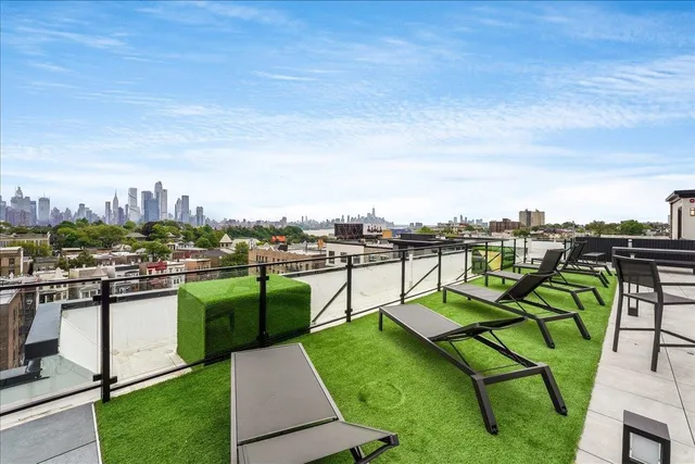 a view of a terrace with furniture