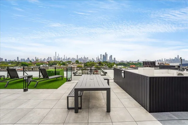 a view of a terrace with sitting area