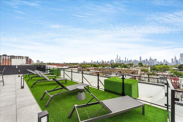 a view of a patio with couches chairs and a table and chairs