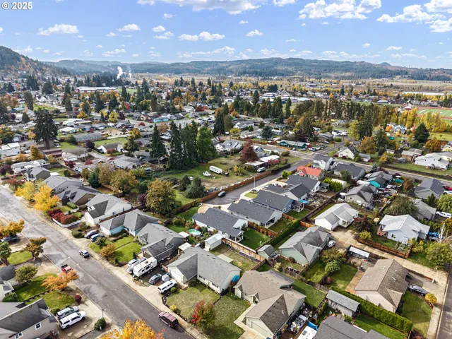 an aerial view of a city with lots of residential buildings