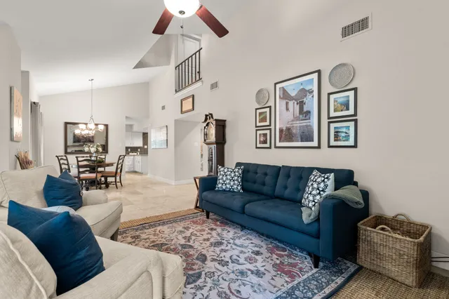 a living room with furniture and a couch