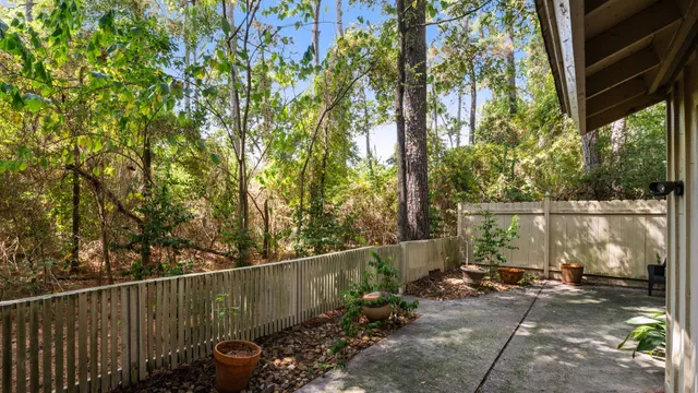 a view of a wooden fence and a bench
