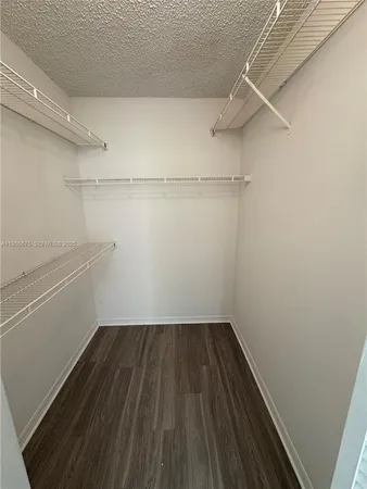 a view of a room with racks on the wall