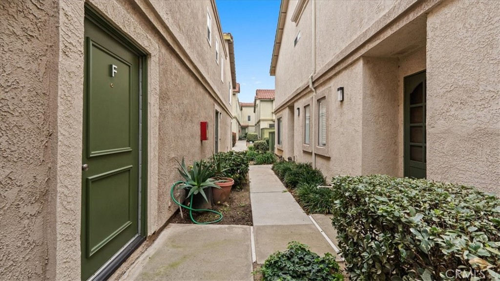 8425 Sunset Trail Place, Unit F Rancho Cucamonga, CA 91730 - Photo 1 of 28 a view of a corridor