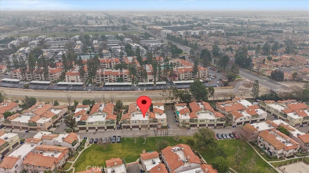 8425 Sunset Trail Place, Unit F Rancho Cucamonga, CA 91730 - Photo 18 of 28 an aerial view of residential houses with outdoor space and swimming pool