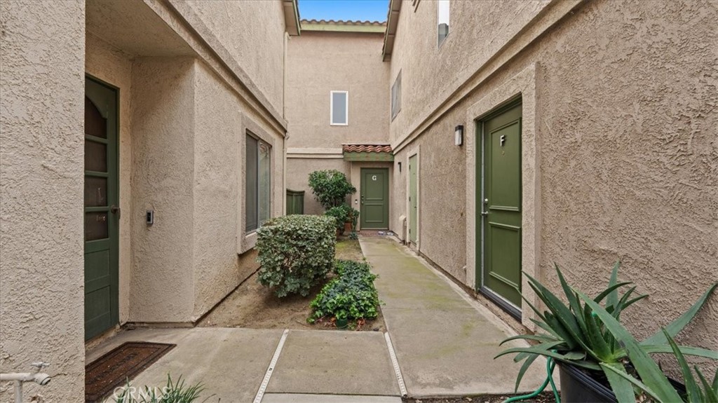 8425 Sunset Trail Place, Unit F Rancho Cucamonga, CA 91730 - Photo 22 of 28 a view of a entryway of the house