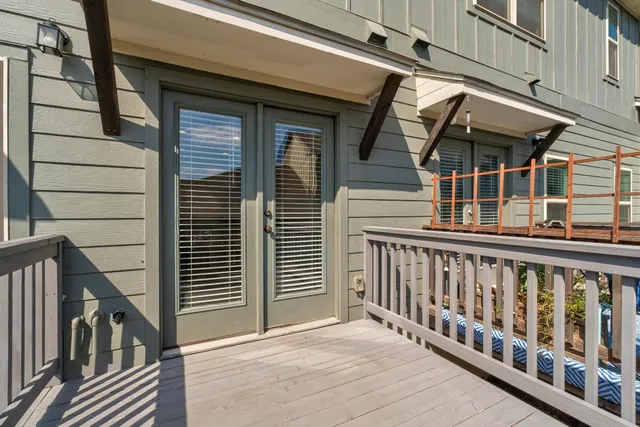 a view of a houses with a balcony