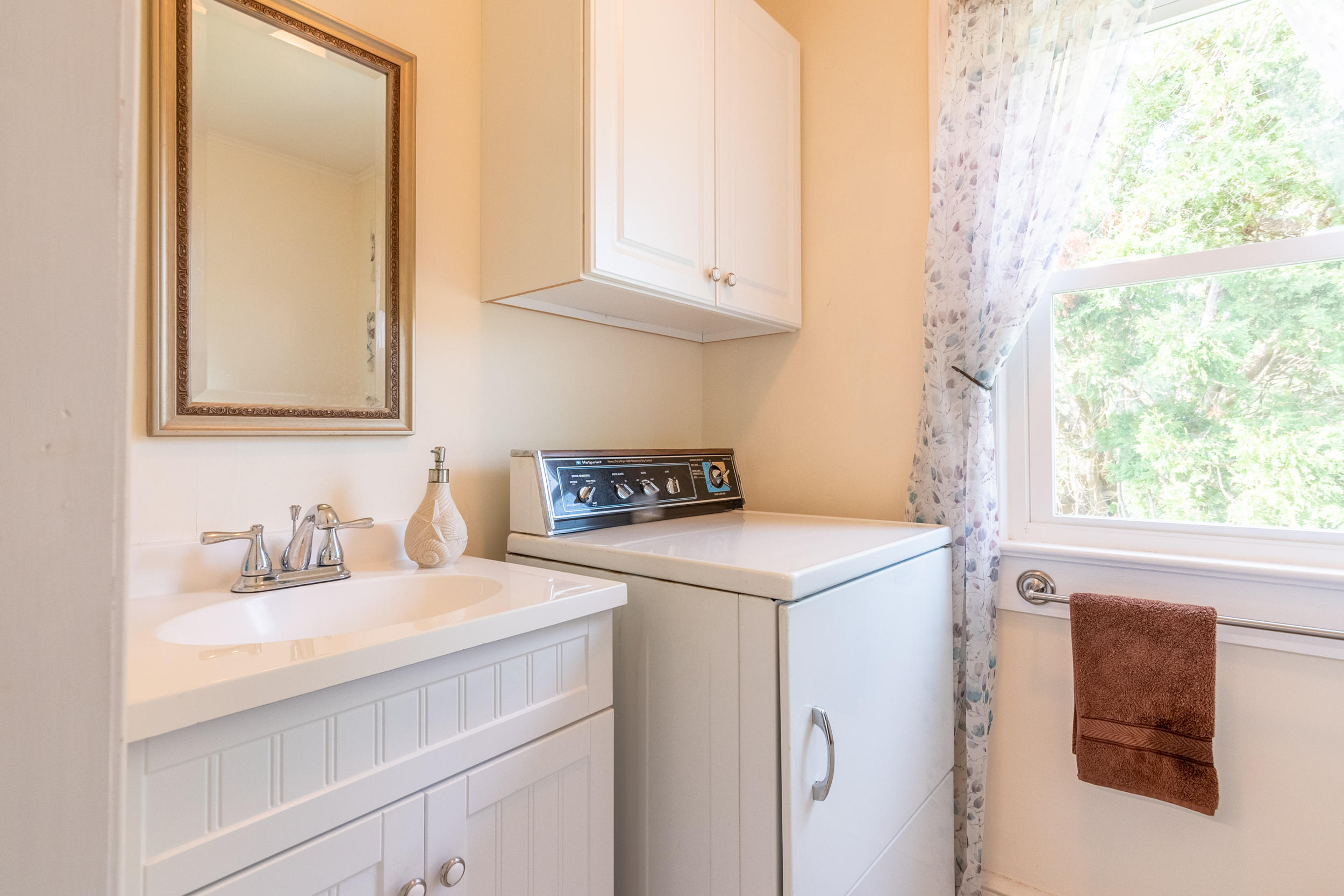856 Conner Grove Road Southwest Willis, VA 24380 - Photo 29 of 63 a bathroom with a sink and a vanity